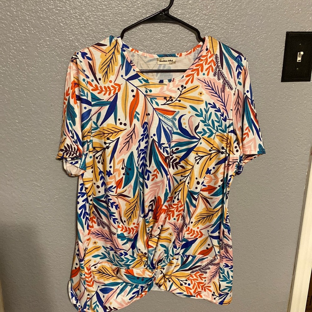 Festive fiesta beachy shirt. Knotted front. Multi colored. Stretchy and soft